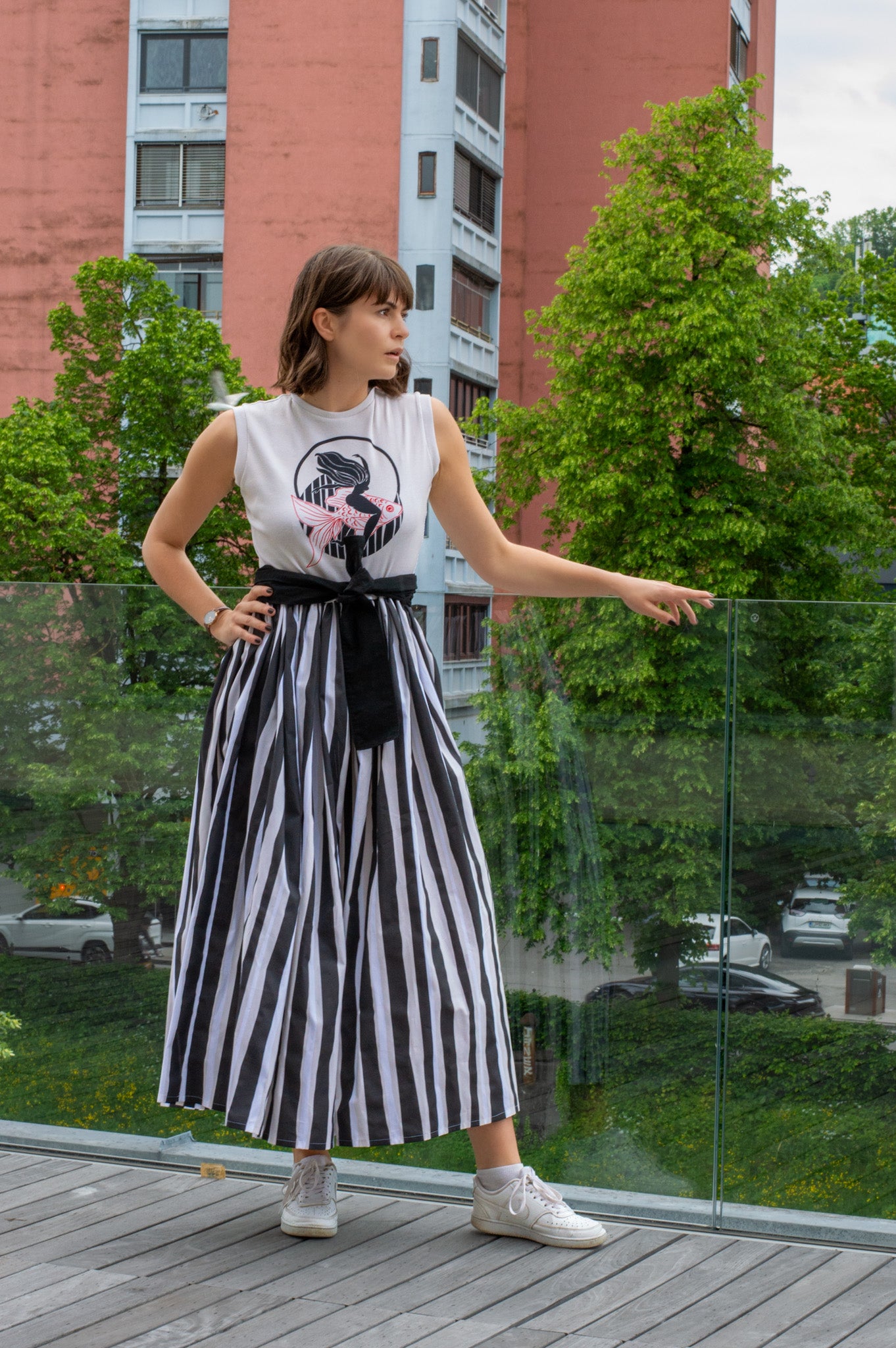 Sleeveless rib dress with striped skirt 