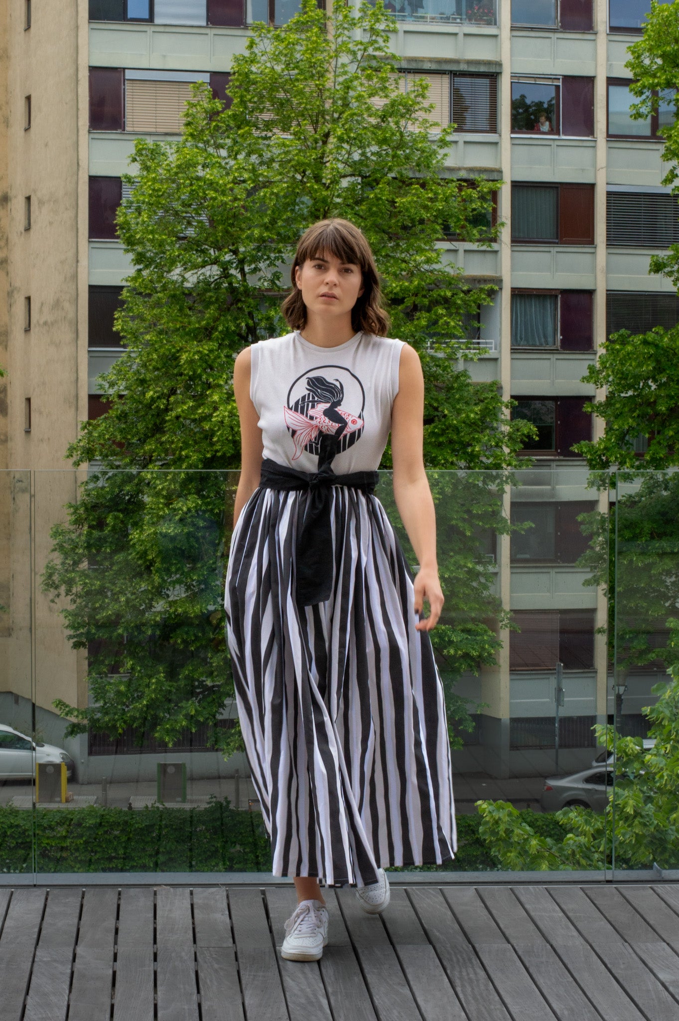 Sleeveless rib dress with striped skirt 