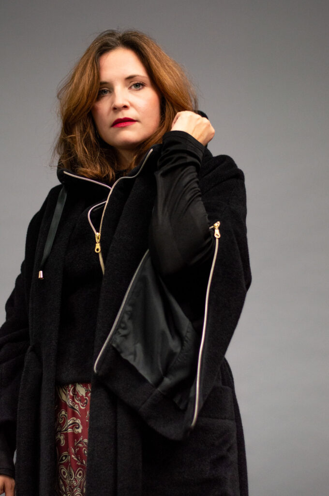 JKH identity black wool coat and hood vest