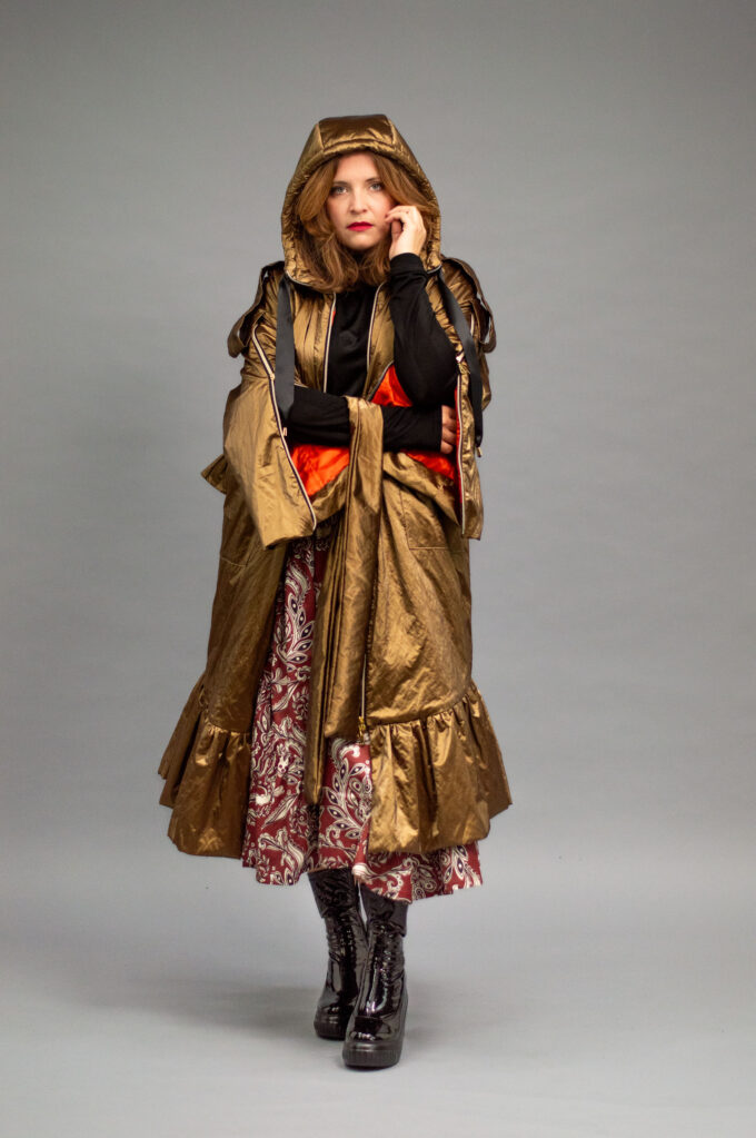 JKH identity gold trench coat with ruffles